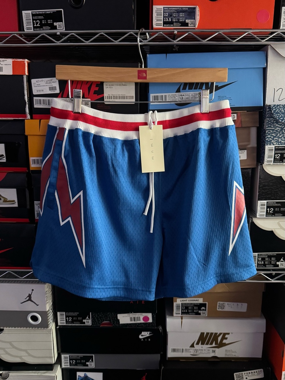 Blue Athletic Shorts with Red & White Lightning Detail